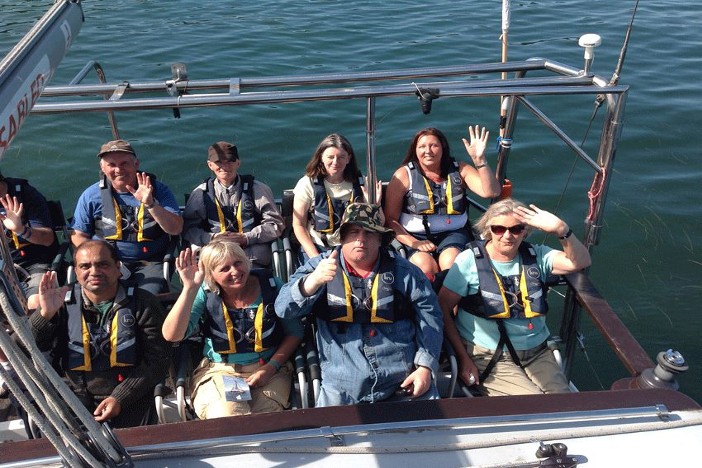 Disabled People Sailing off the Coast of Dorset